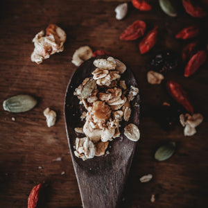 A wooden spoon with Red Lime Jones Granola I am Sassy Granola